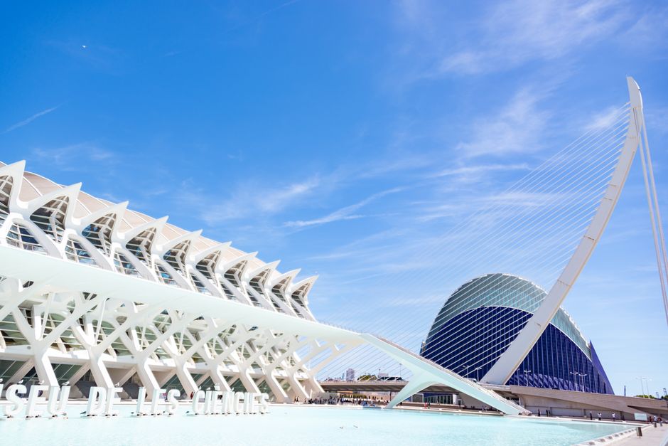 Explore the modern architecture of Valencia's City of Arts and Sciences under a clear blue sky.