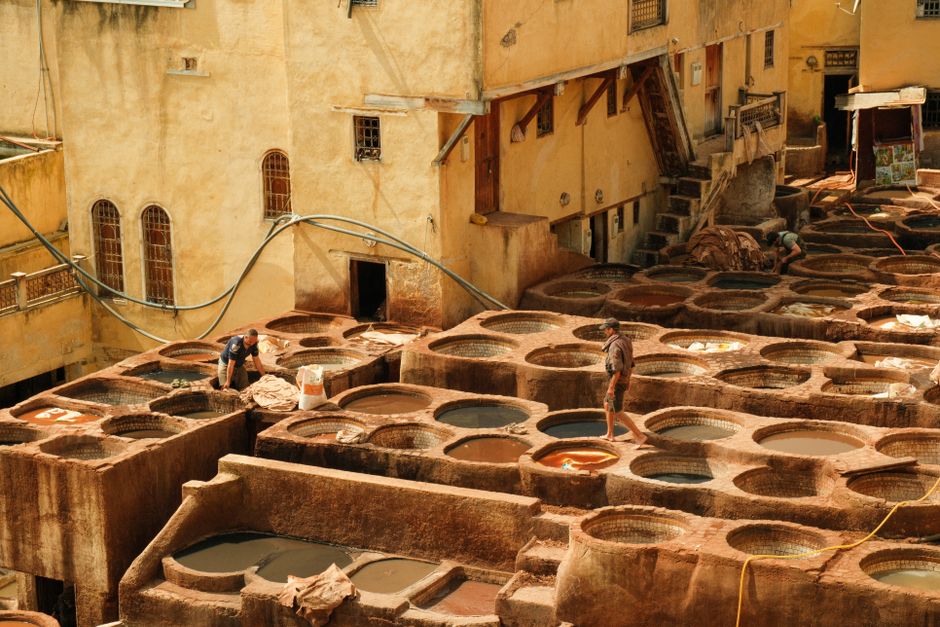 Explore the vibrant and historic tanneries of Fes, Morocco, showcasing traditional leather-making processes.